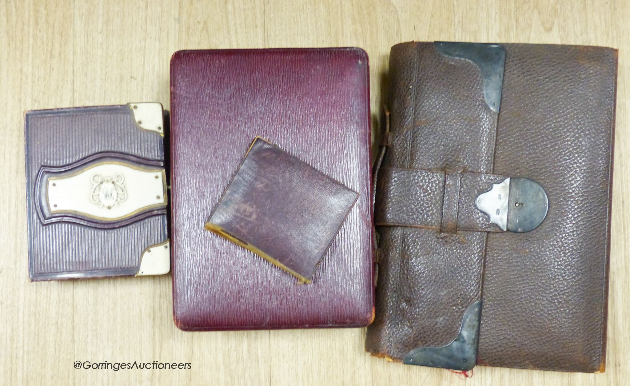 A silver mounted leather writing case, box, a photograph album and Ambrotype.